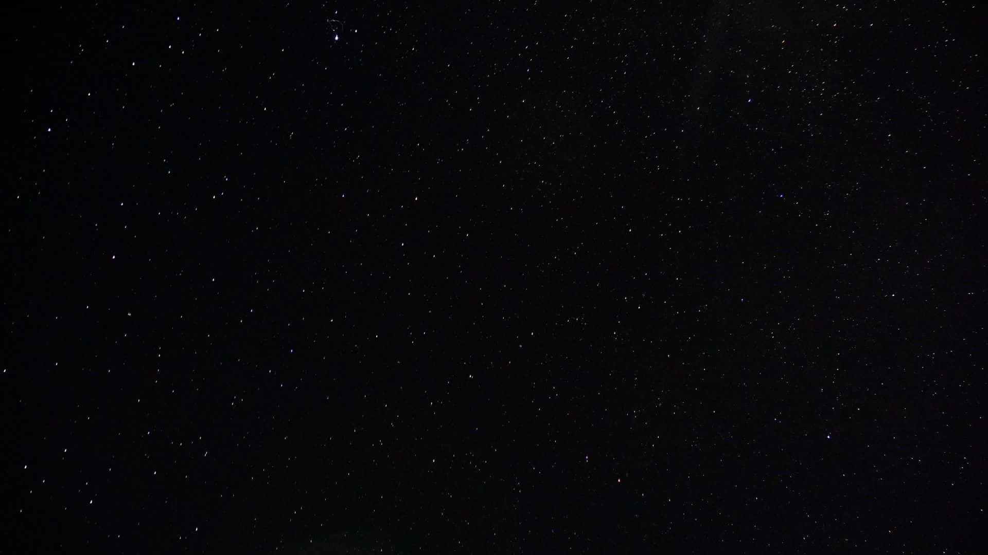 Dark Night 桌布 壁紙 — 廣闊漆黑的夜空，無數閃爍的星星散落在虛空中。