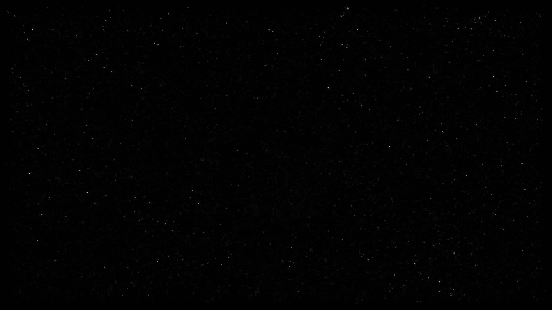 Black And White Star 桌布 壁紙 — 廣闊的黑色天空中點綴著無數細小的白色星星，營造出寧靜的宇宙空間。