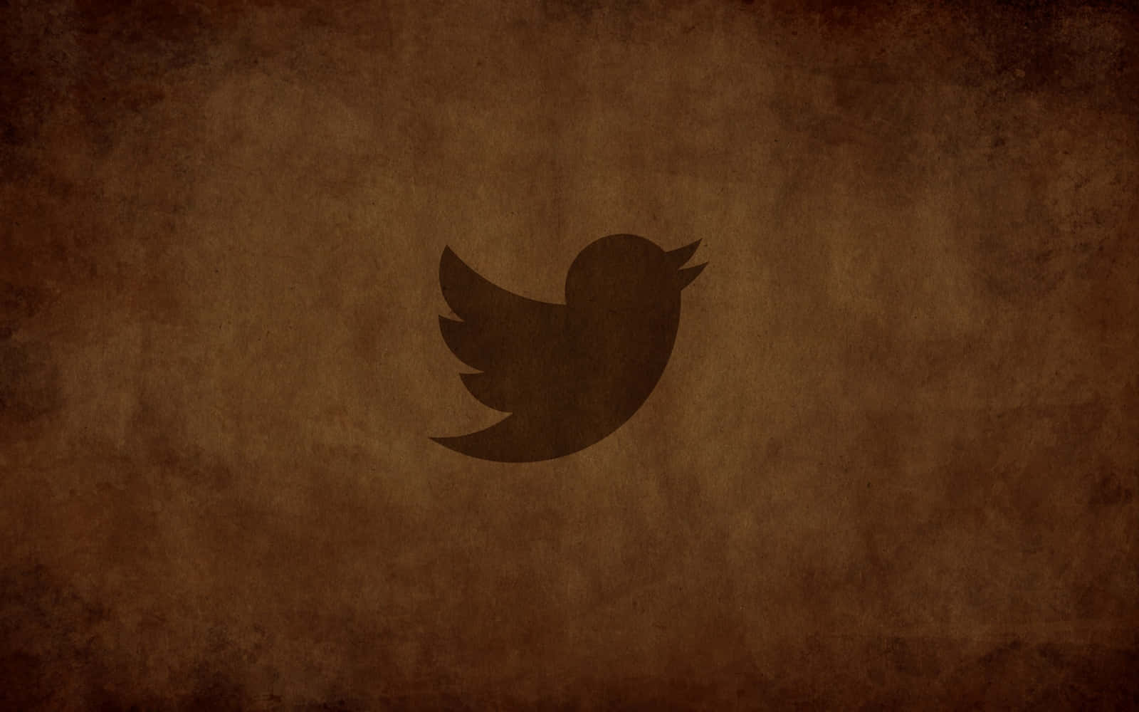 Twitter 鳥類標誌在有紋理的棕色背景上