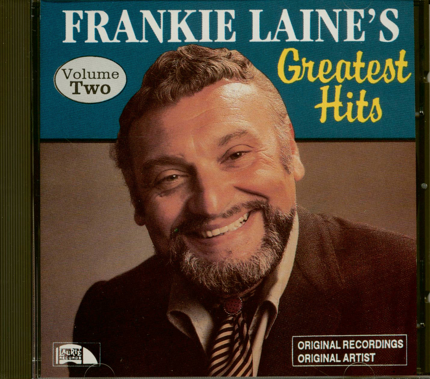 Frankie Laine 喺佢嘅 Greatest Hits Volume Two 唱片封面上微笑。