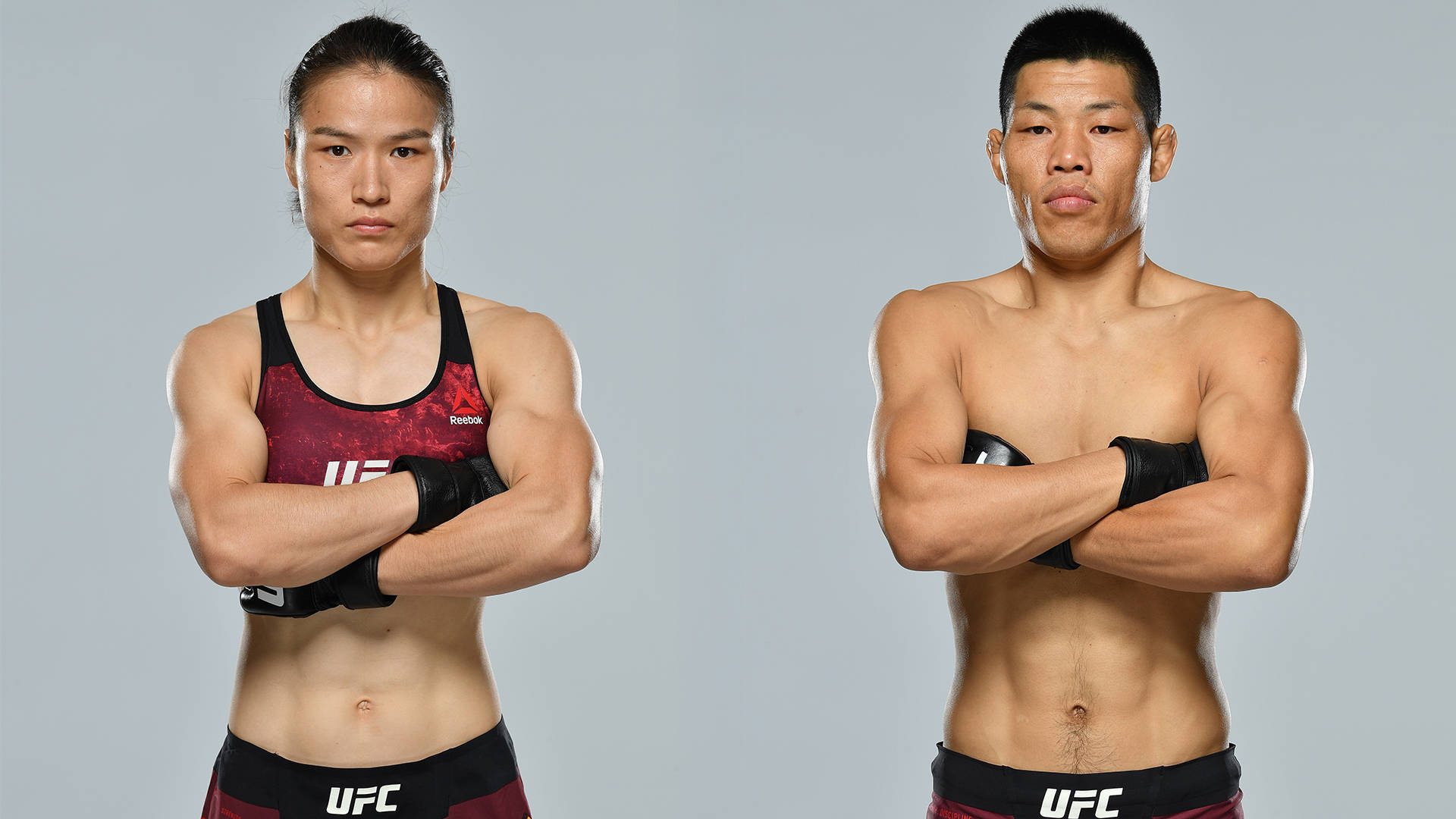 兩名UFC拳手在攝影棚中交叉雙臂擺姿勢。