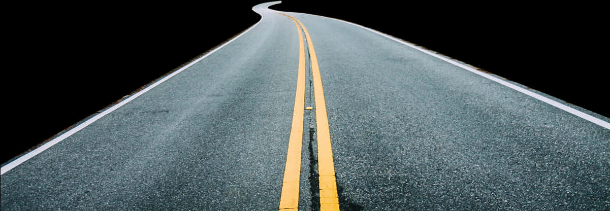 彎曲的瀝青道路與黃色標線 壁紙