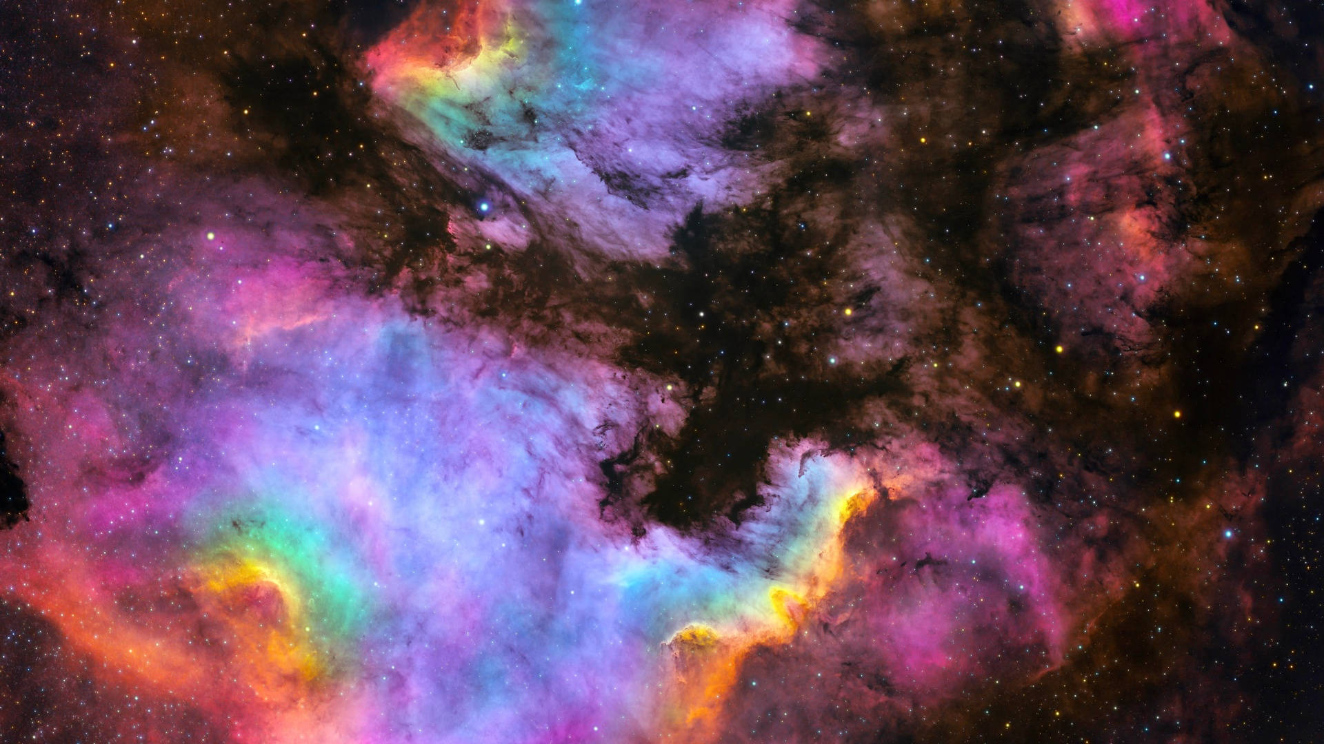 彩虹美學星系深空 壁紙 — 充滿活力的宇宙星雲在星空背景下以電紫色、粉紅色和藍色旋轉。
