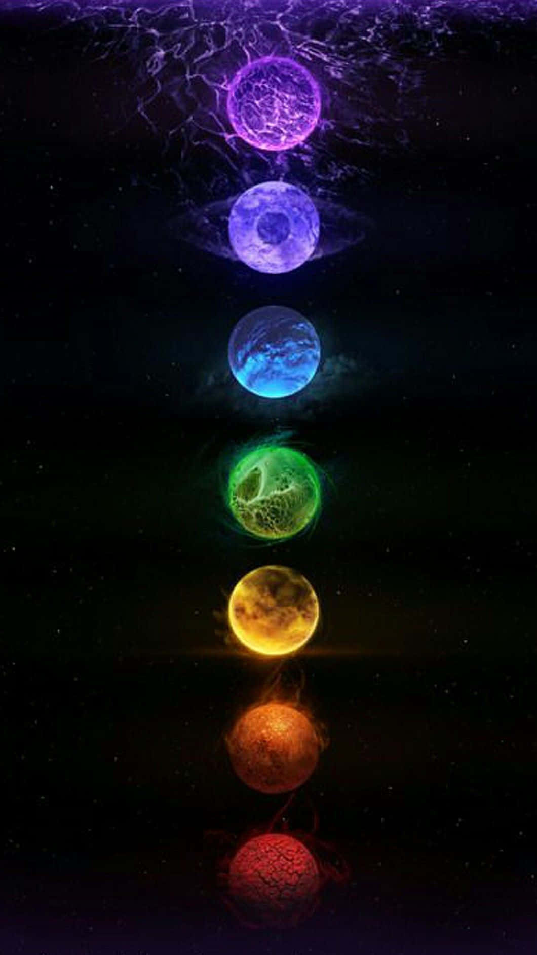 七個發光的彩虹色脈輪球體垂直漂浮在太空中。