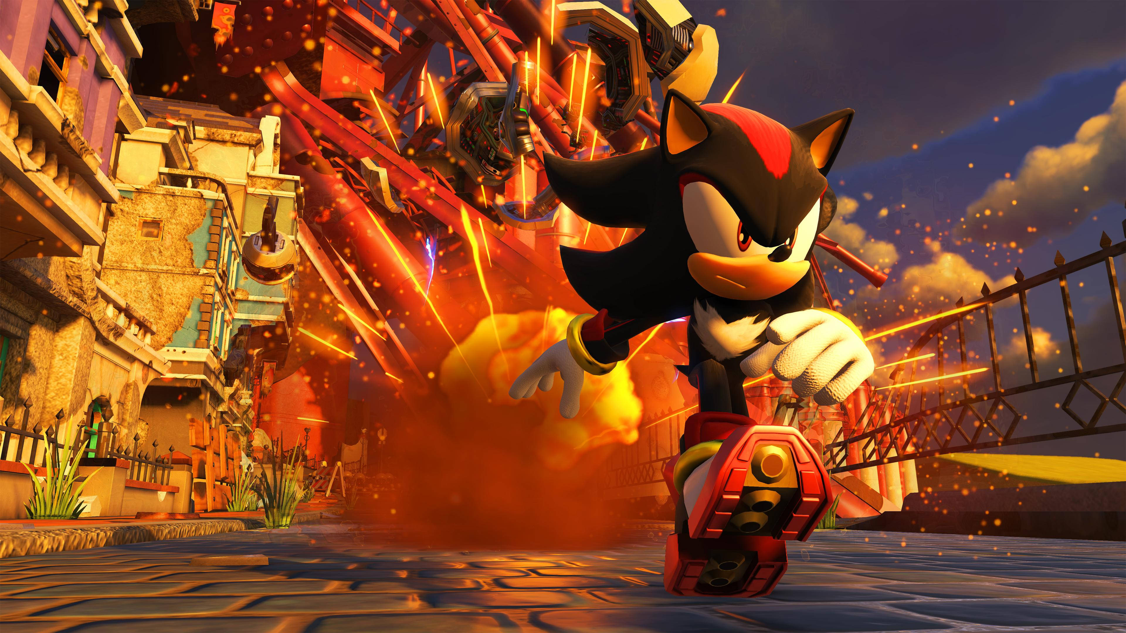 影子刺猬立於廢墟之中 壁紙 — Shadow the Hedgehog 喺一個火海嘅城市後巷中疾馳，周圍有爆炸同碎片飛舞。