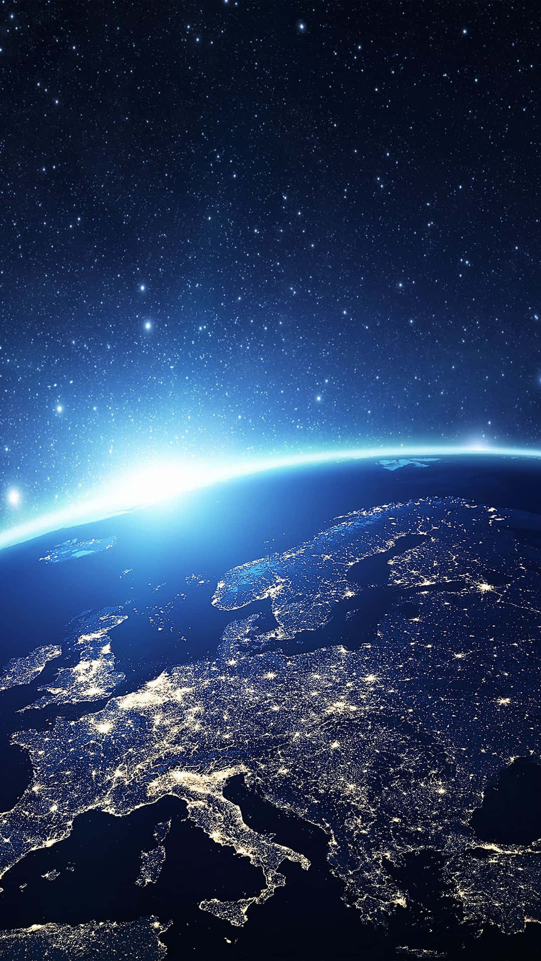 從太空觀看地球的夜景，顯示歐洲的城市燈光與星空。