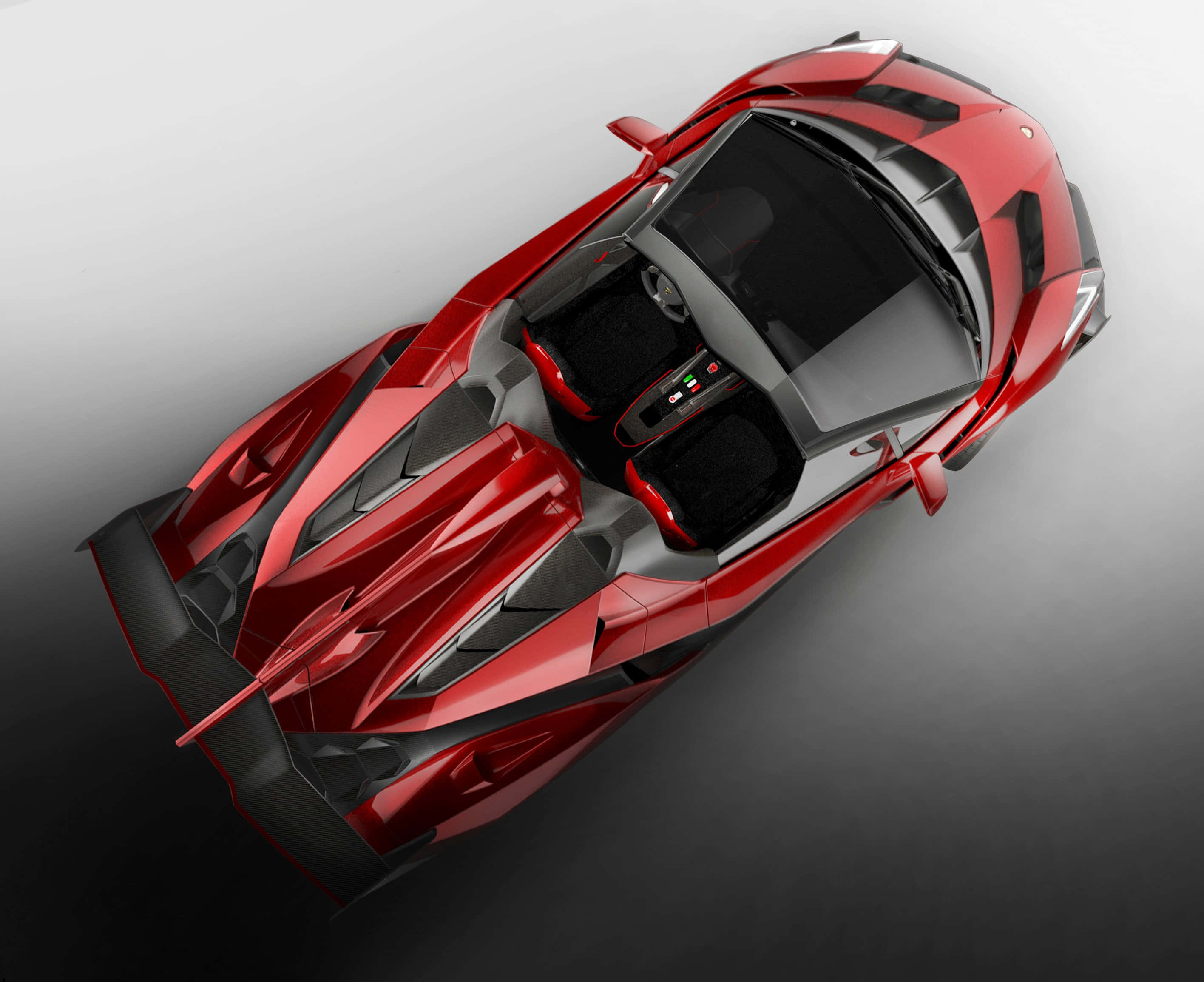 Lamborghini Veneno 桌布 壁紙 — 從上方俯瞰，一輛帶有黑色裝飾的時尚紅色跑車，背景為漸變灰色。