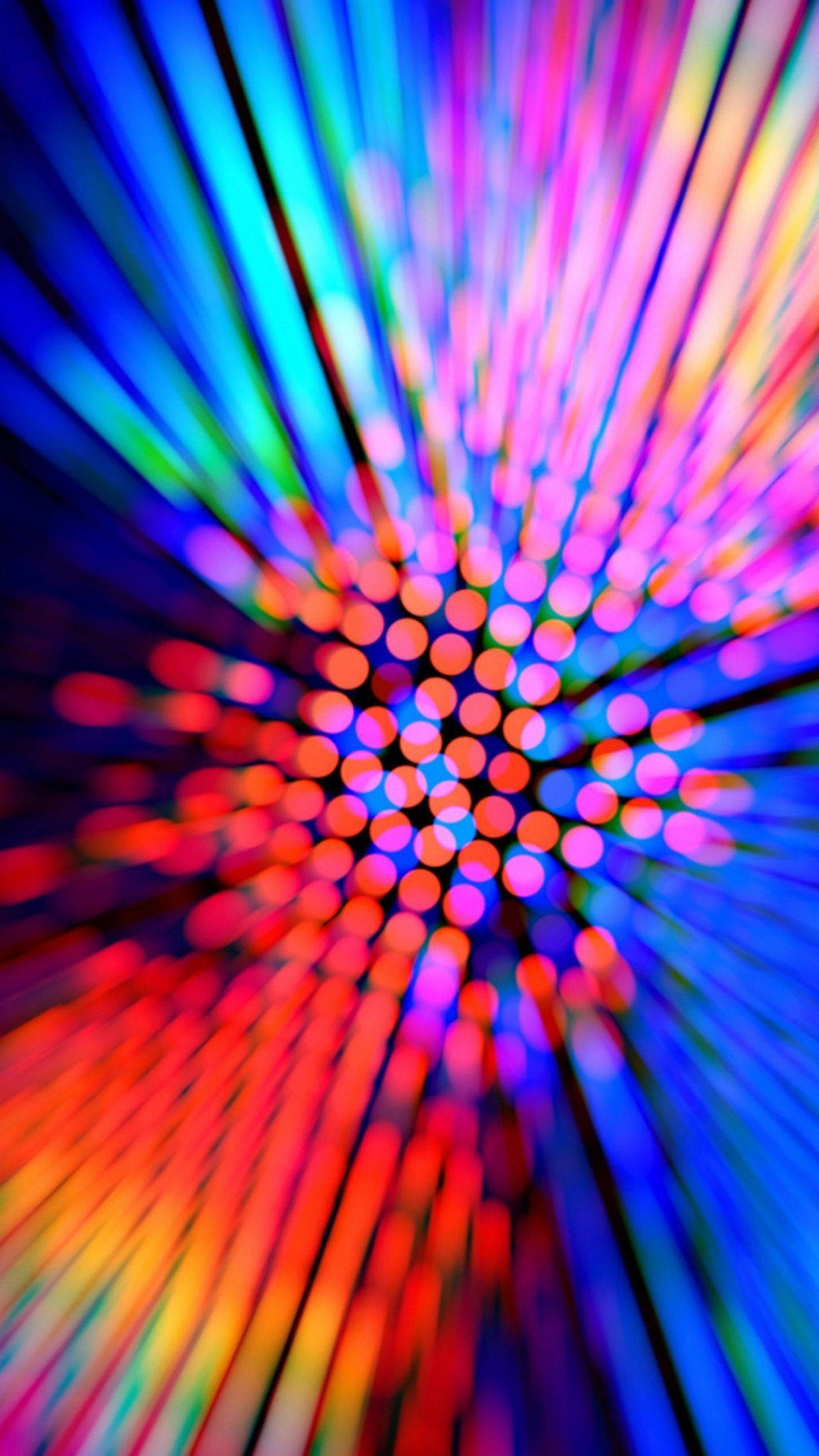 Disco 桌布 壁紙 — 從中央發光球體簇放射出的鮮豔徑向模糊霓虹燈光爆發。