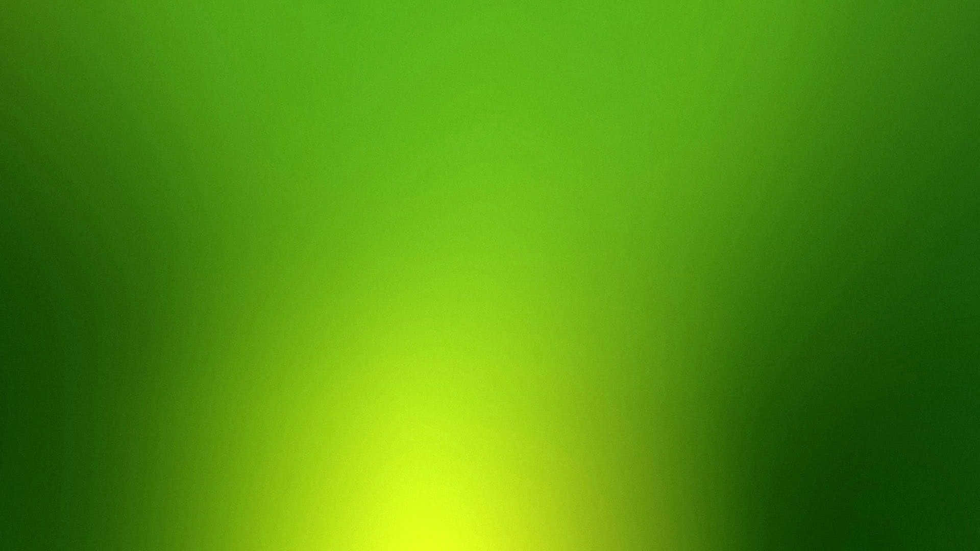Solid Green 桌布 壁紙 — 從亮黃色中心向深森林綠色邊緣輻射的平滑綠色漸變。