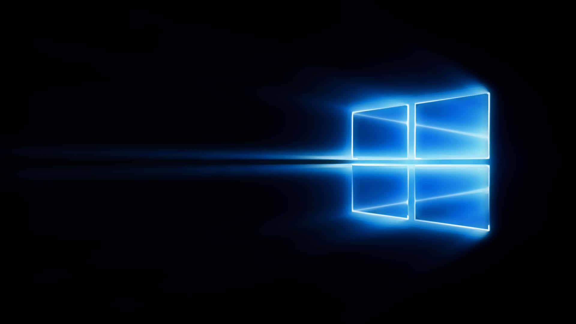 發光藍色Windows標誌在黑暗表面上的反射