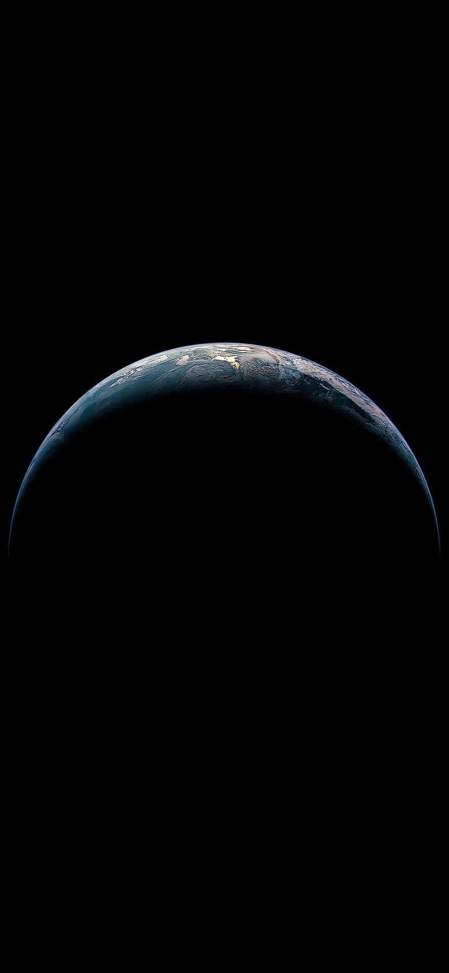 地球彎曲的地平線，城市燈光在太空的黑暗虛空中可見。