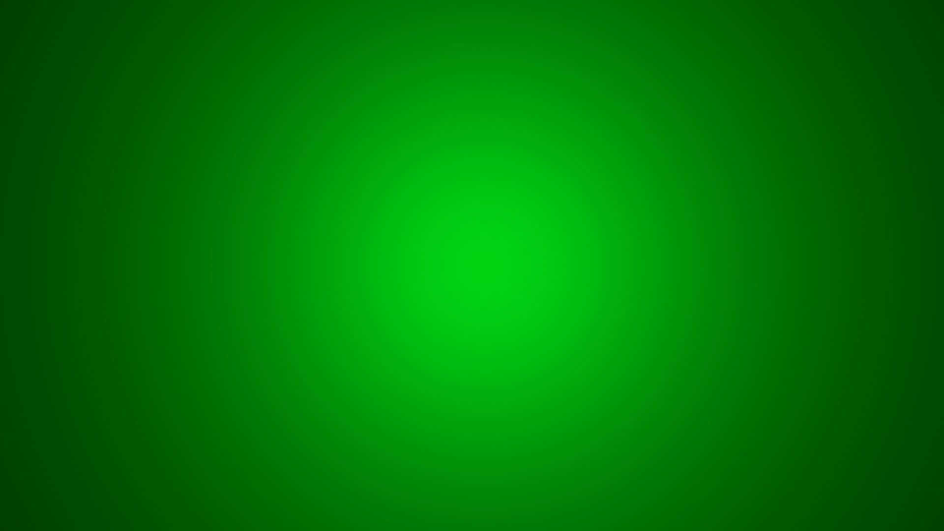 Green Solid Color 桌布 壁紙 — 從明亮中心向較暗邊緣擴散的平滑綠色漸變，營造出平靜的抽象背景。