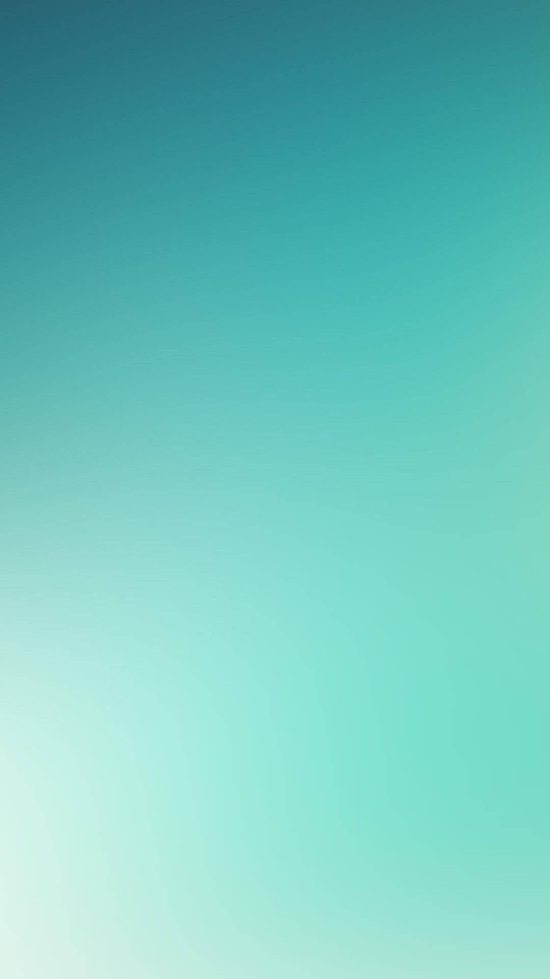iPhone 桌布 壁紙 — 從深藍綠色過渡到柔和薄荷綠的寧靜漸變牆紙。
