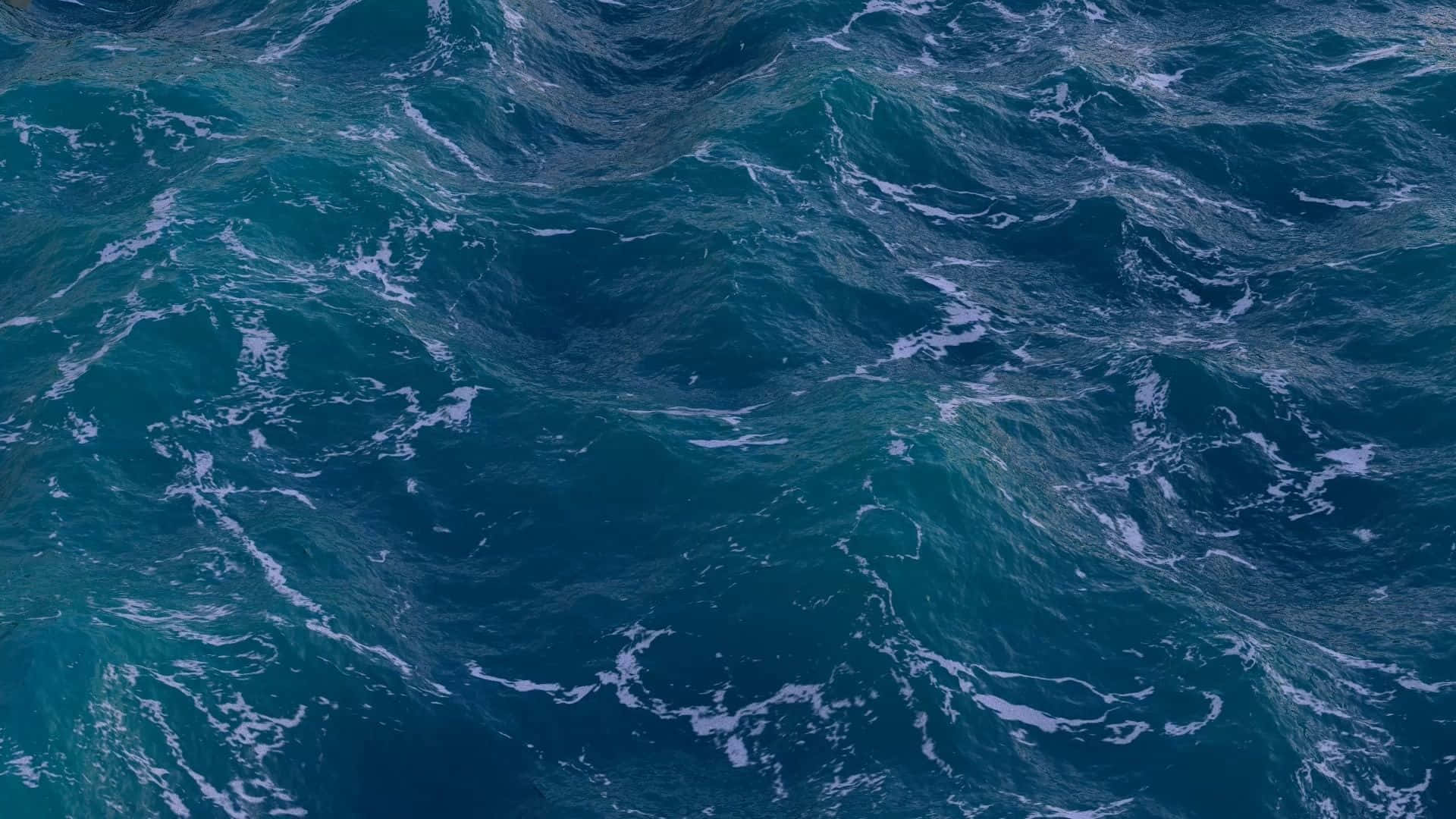 3d Ocean 桌布 壁紙 — 從高空俯瞰，青綠色的海浪洶湧澎湃，白色泡沫在混亂中旋轉。