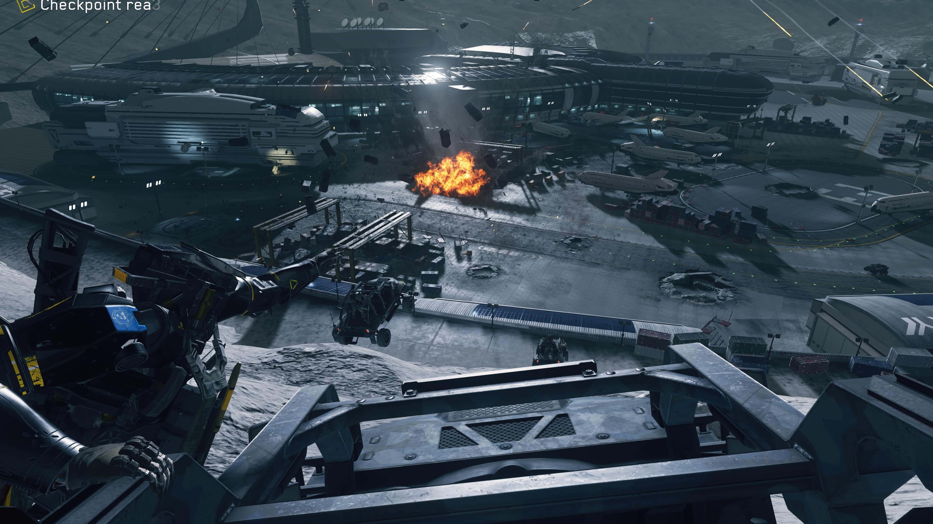 Call Of Duty Vehicles 桌布 壁紙 — 從高處俯瞰，前景有金屬結構，雪覆蓋的未來城市景觀中爆發了一場熾熱的爆炸。