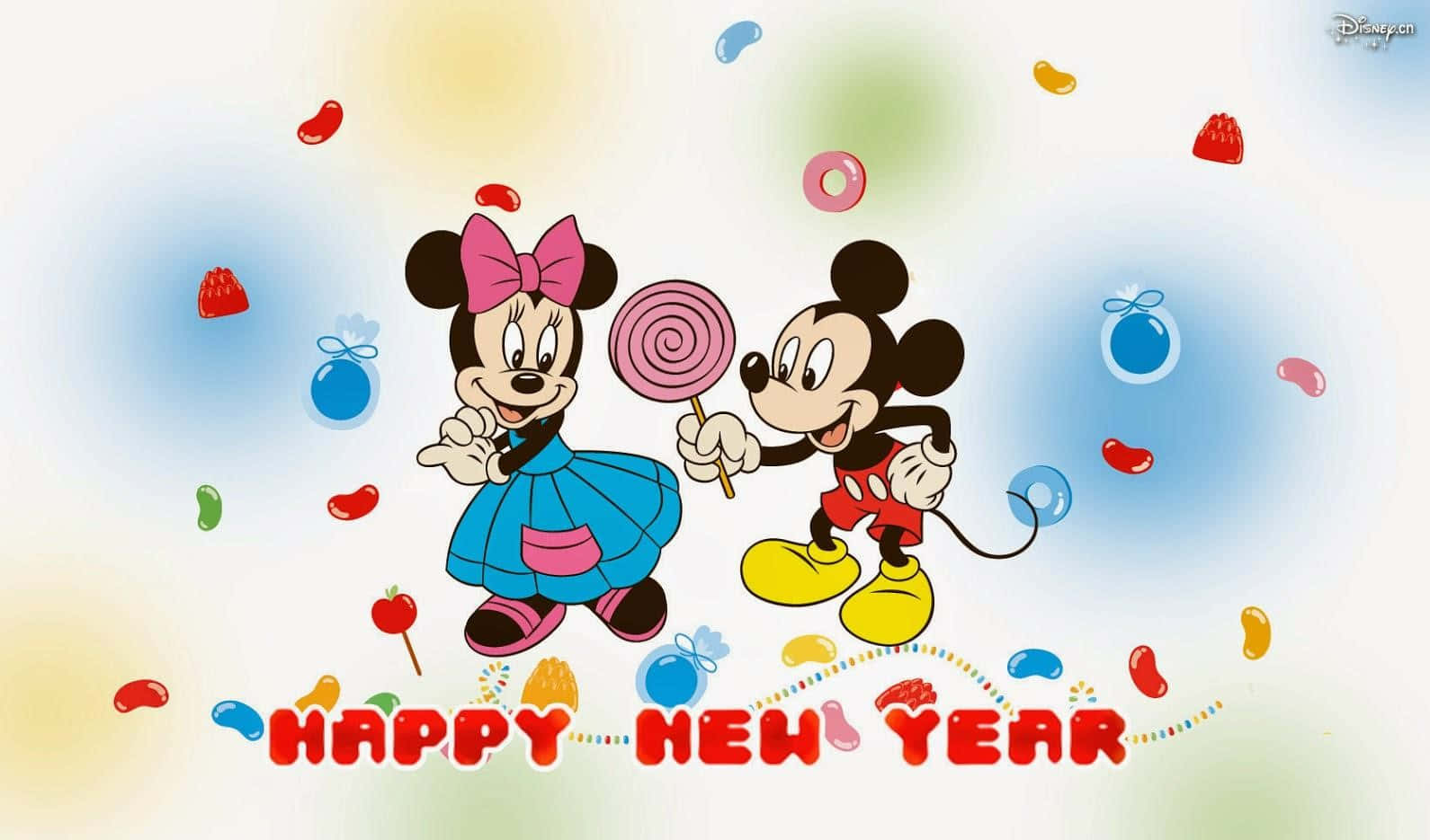 米奇和米妮老鼠用糖果和棒棒糖慶祝新年。