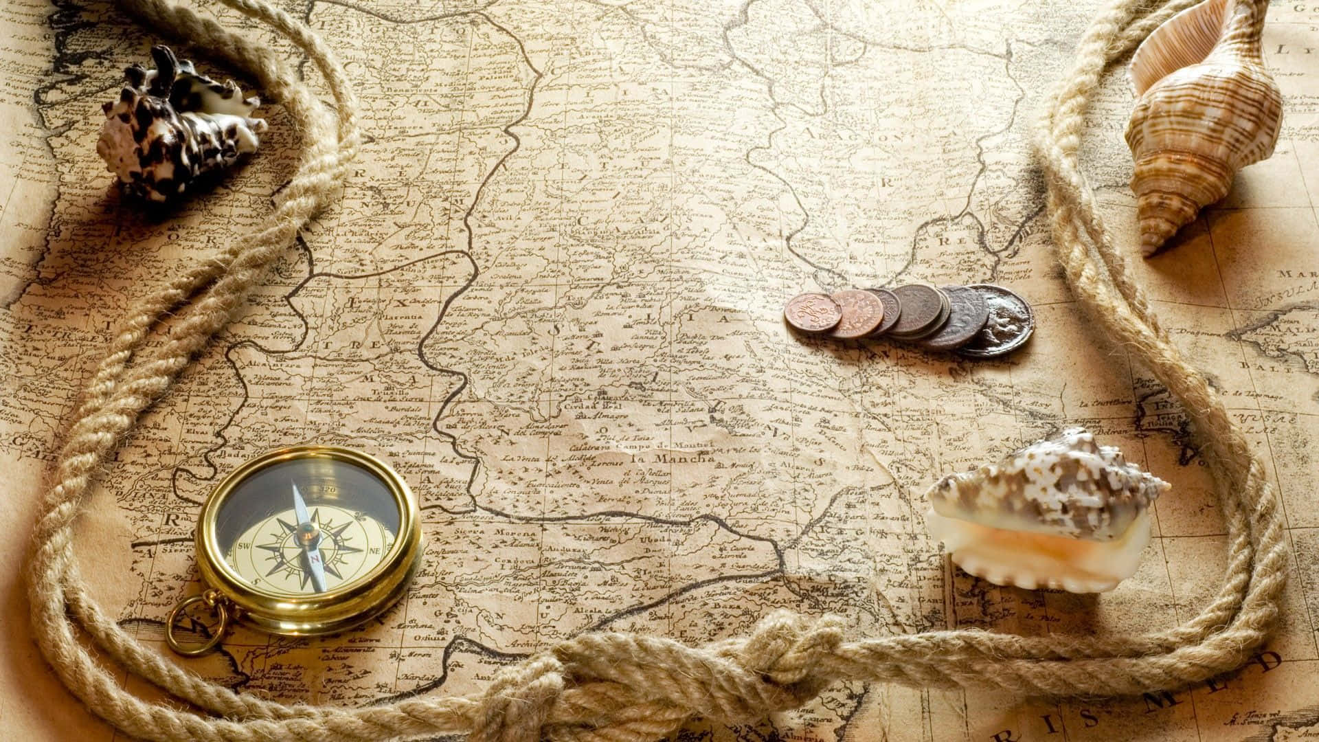 Treasure 桌布 壁紙 — 復古地圖飾有繩索、貝殼、硬幣和指南針，喚起懷舊的海上冒險。