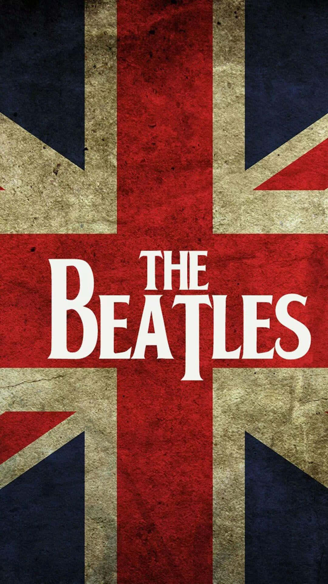 披頭四 桌布 壁紙 — 復古紋理 Union Jack 旗幟，中央突出顯示粗體白色文字 The Beatles。