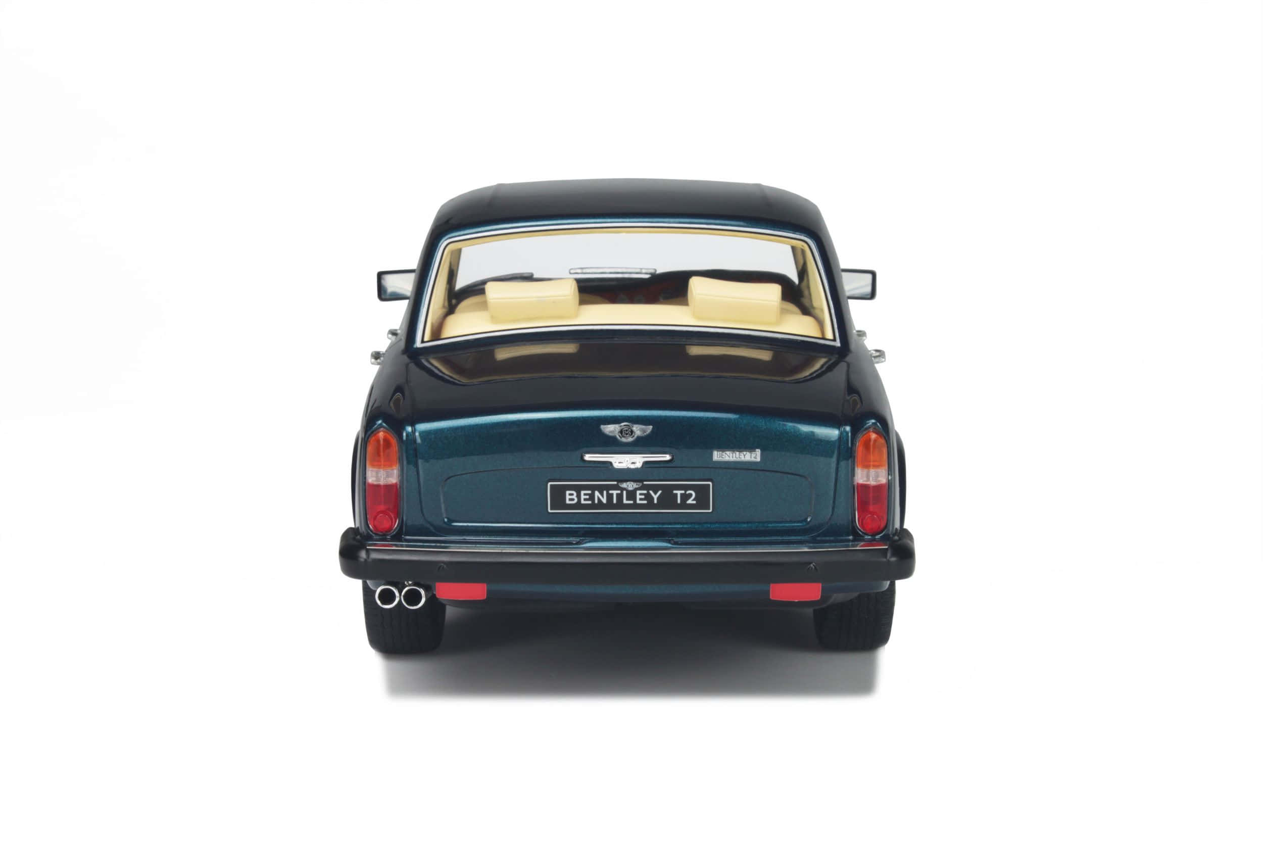 Bentley T2 桌布 壁紙 — 復古青綠色 Bentley T2 模型車的後視圖，配以奶油色內飾，背景為純白色。