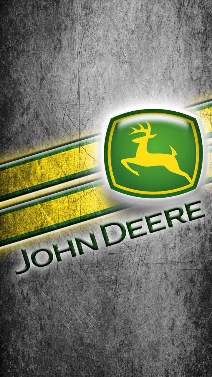 John Deere 標誌，帶有跳躍鹿，在帶有黃色條紋的紋理灰色背景上。