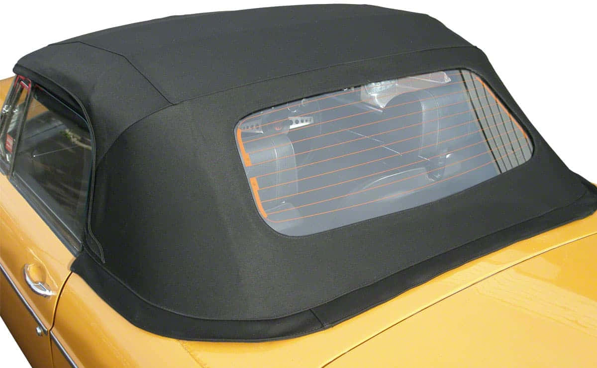 Car Hood 桌布 壁紙 — 復古黃色開篷車黑色軟頂的特寫，後窗露出橙色內飾細節。