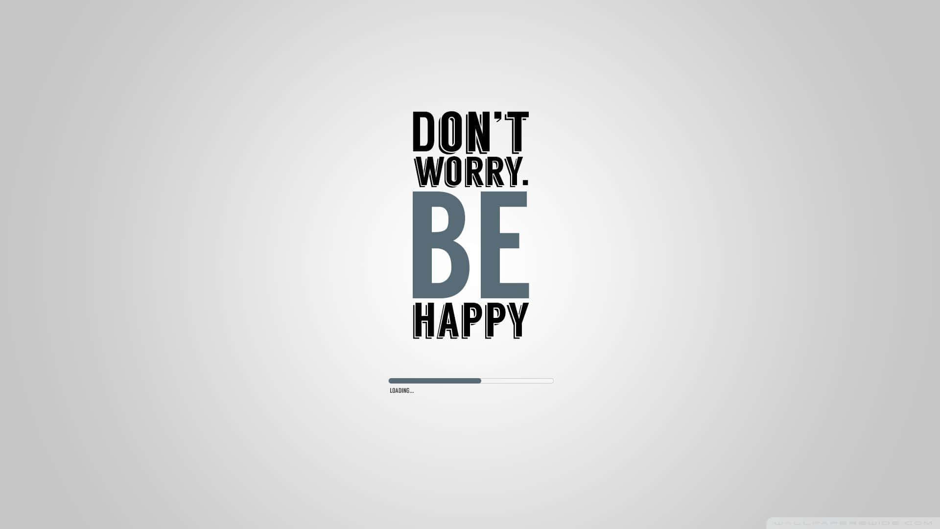 勵志語句「don't worry be happy」以粗體文字顯示在灰色背景上