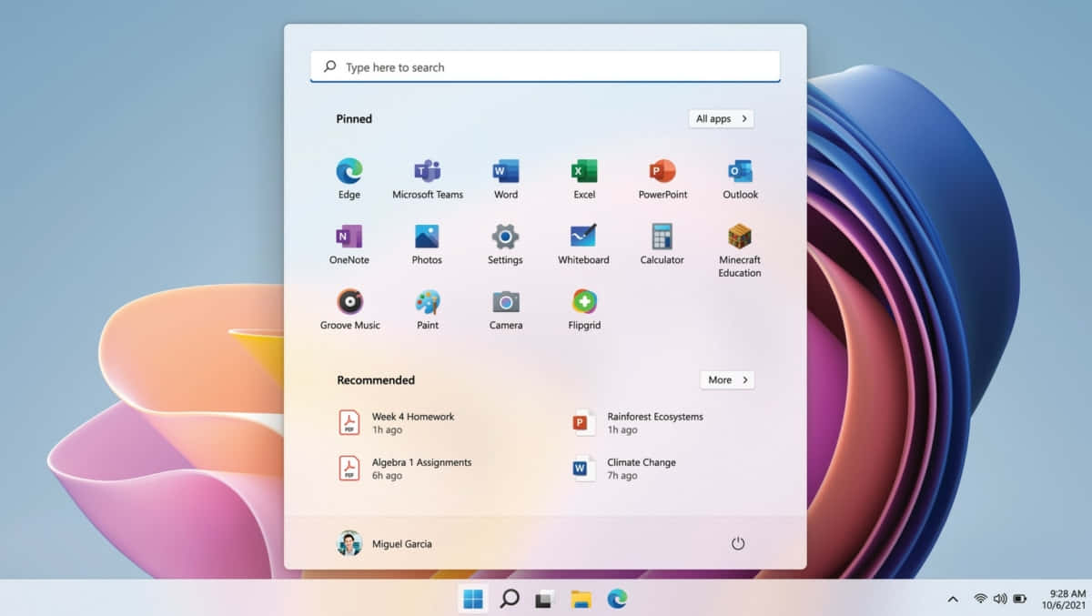 Windows 11 開始功能表顯示已釘選的應用程式和最近的文件，背景為粉彩抽象圖案。