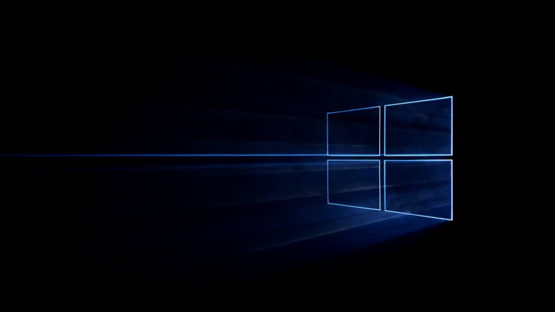 黑暗背景中帶有光線的發光藍色Windows標誌