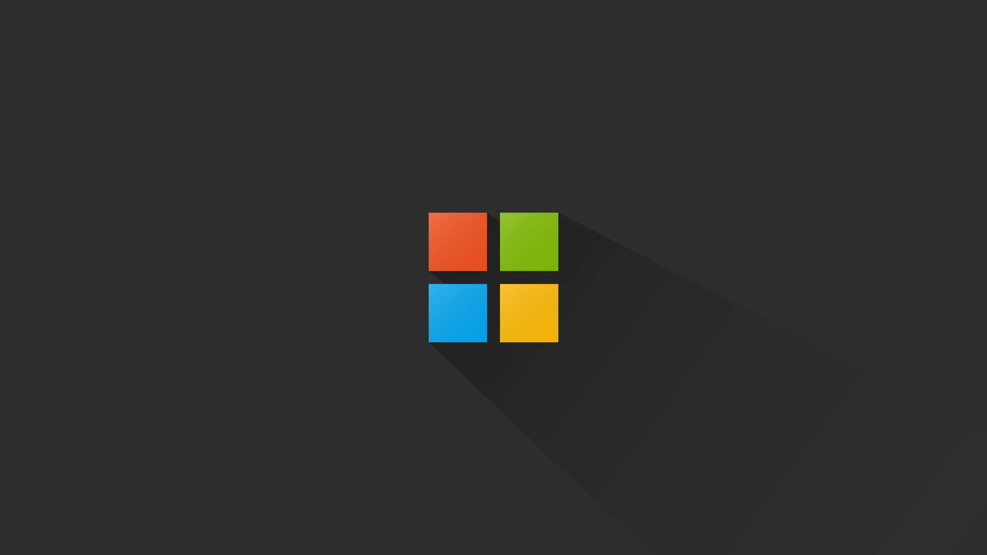 Microsoft 標誌，四個彩色正方形在深灰色背景上。
