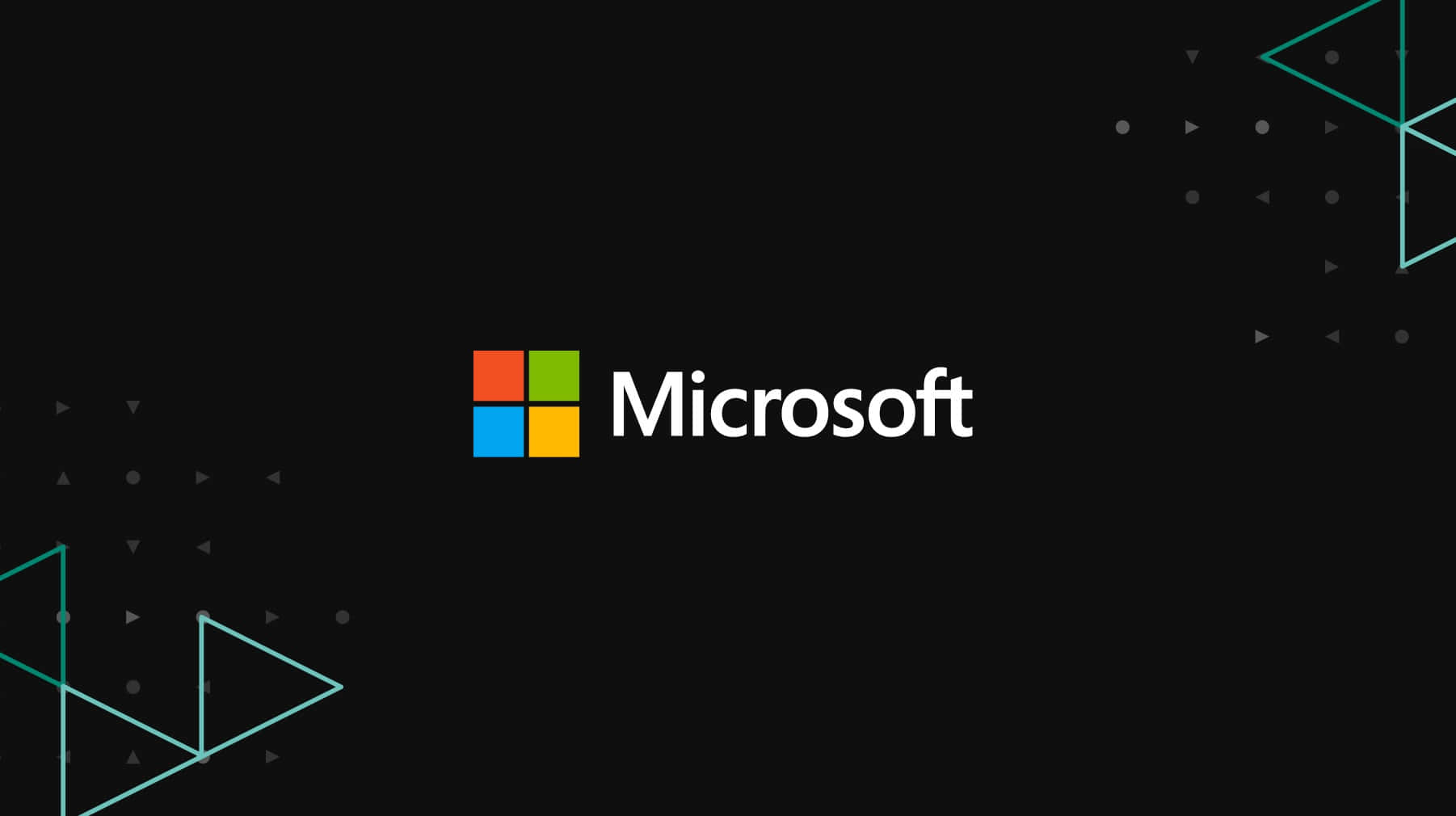 黑色背景上帶有青綠色幾何形狀的 Microsoft 標誌