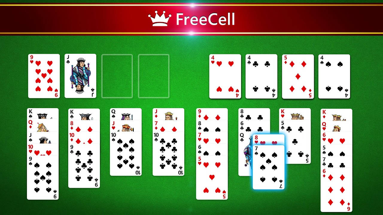 FreeCell接龍遊戲界面，卡片在綠色絨布背景上。