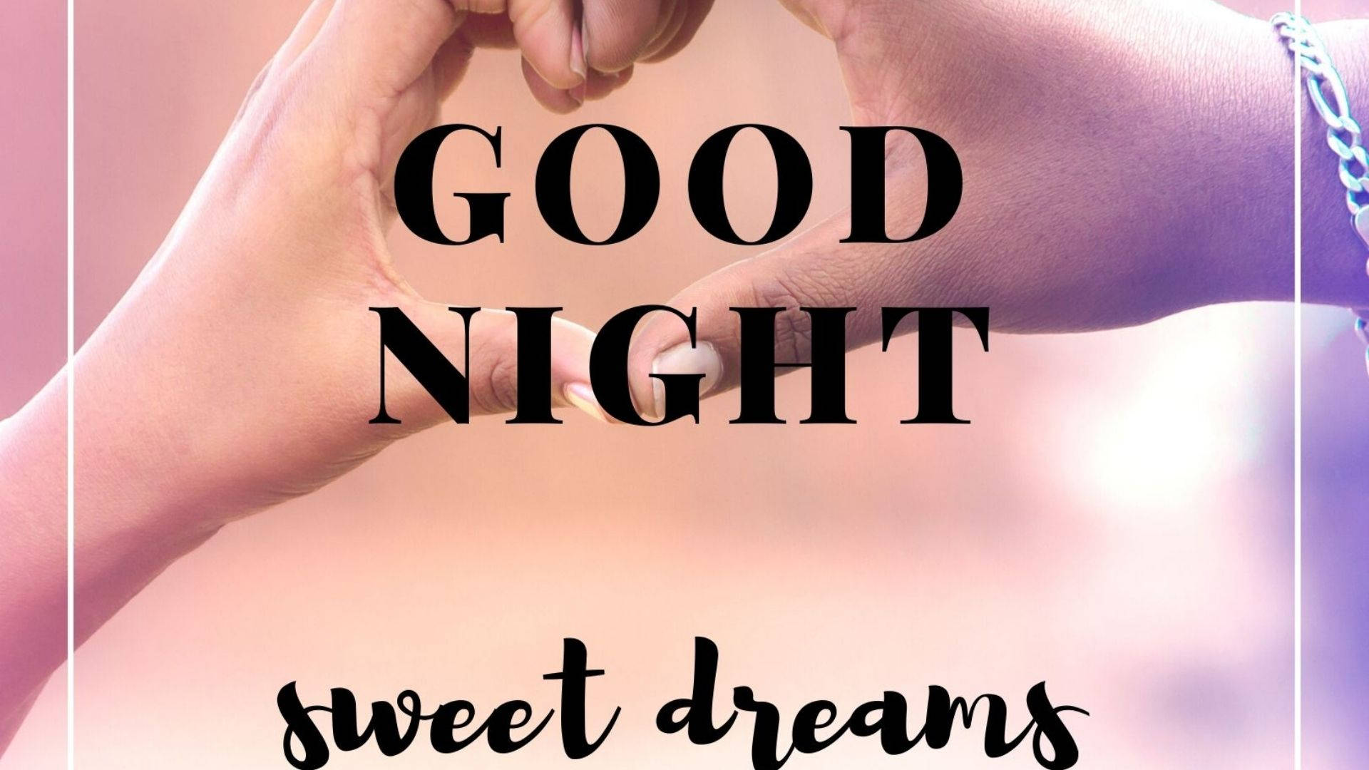 心形雙手與甜夢 壁紙 — 兩隻手形成一個心形，上方有粗體文字「GOOD NIGHT」和「sweet dreams」，背景為柔和的粉紅和紫色漸變。