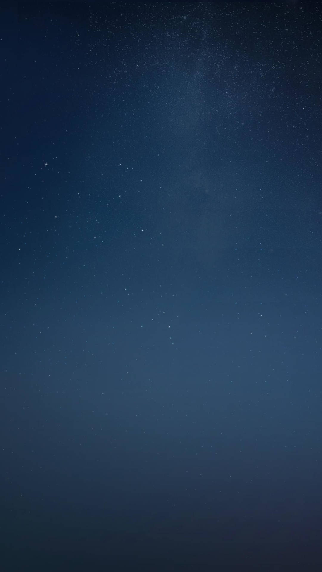 繁星點點的夜空，淡淡的銀河在深藍色調中閃耀。