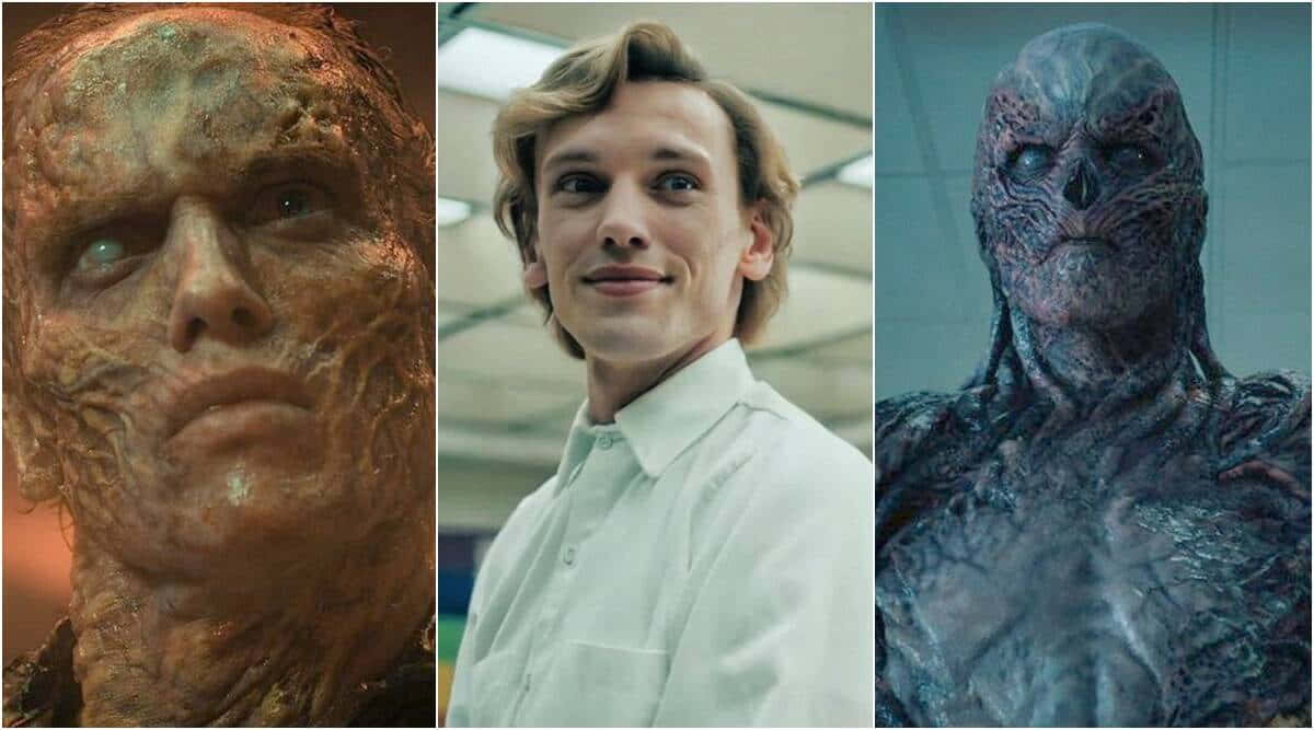 一名身穿白襯衫的男子站在兩個皮膚紋理粗糙的變異外星生物之間。