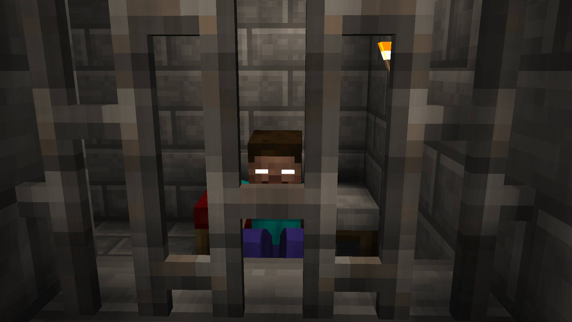 Minecraft角色在石頭監獄牢房裏有火炬