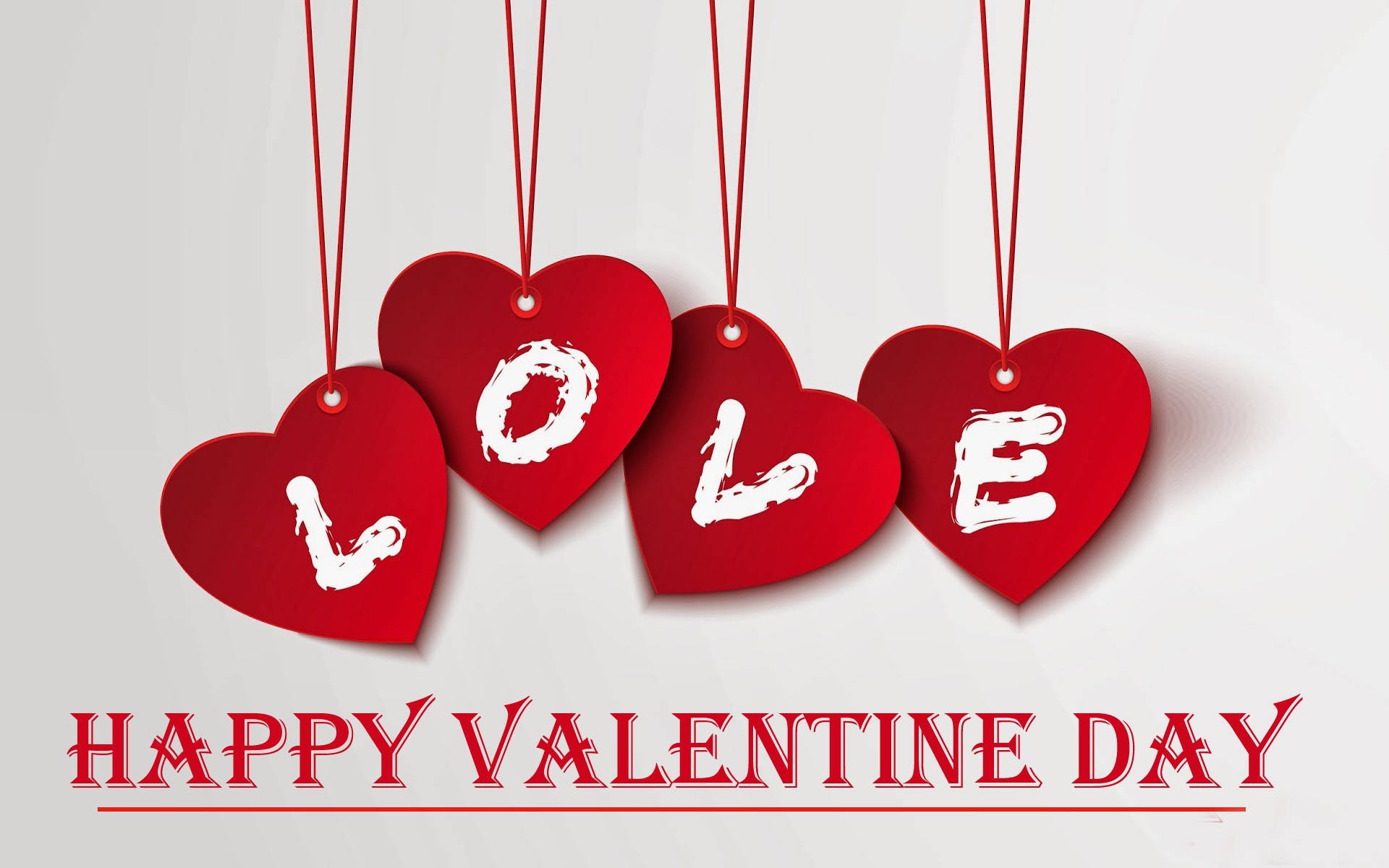 紅色心形標籤拼出LOVE，懸掛在「HAPPY VALENTINE DAY」文字上方。