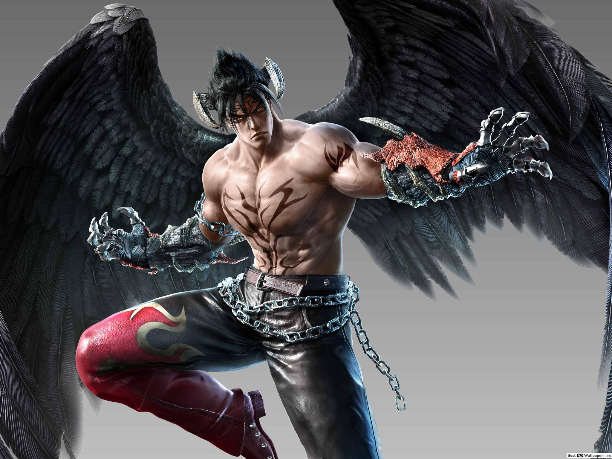 惡魔金· Kazama 鬥技遊戲 壁紙 — 一個肌肉發達的動漫惡魔，擁有黑色翅膀和利爪，在灰色背景前擺出兇猛的姿勢。