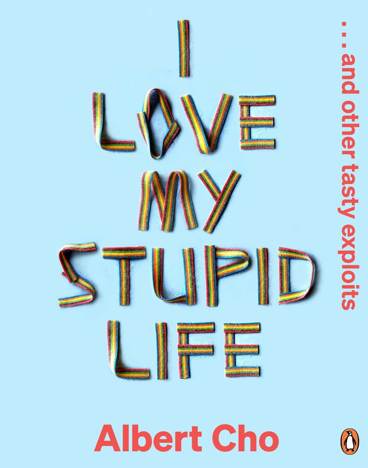 書籍封面，藍色背景上有多彩條紋字母拼出「I LOVE MY STUPID LIFE」。