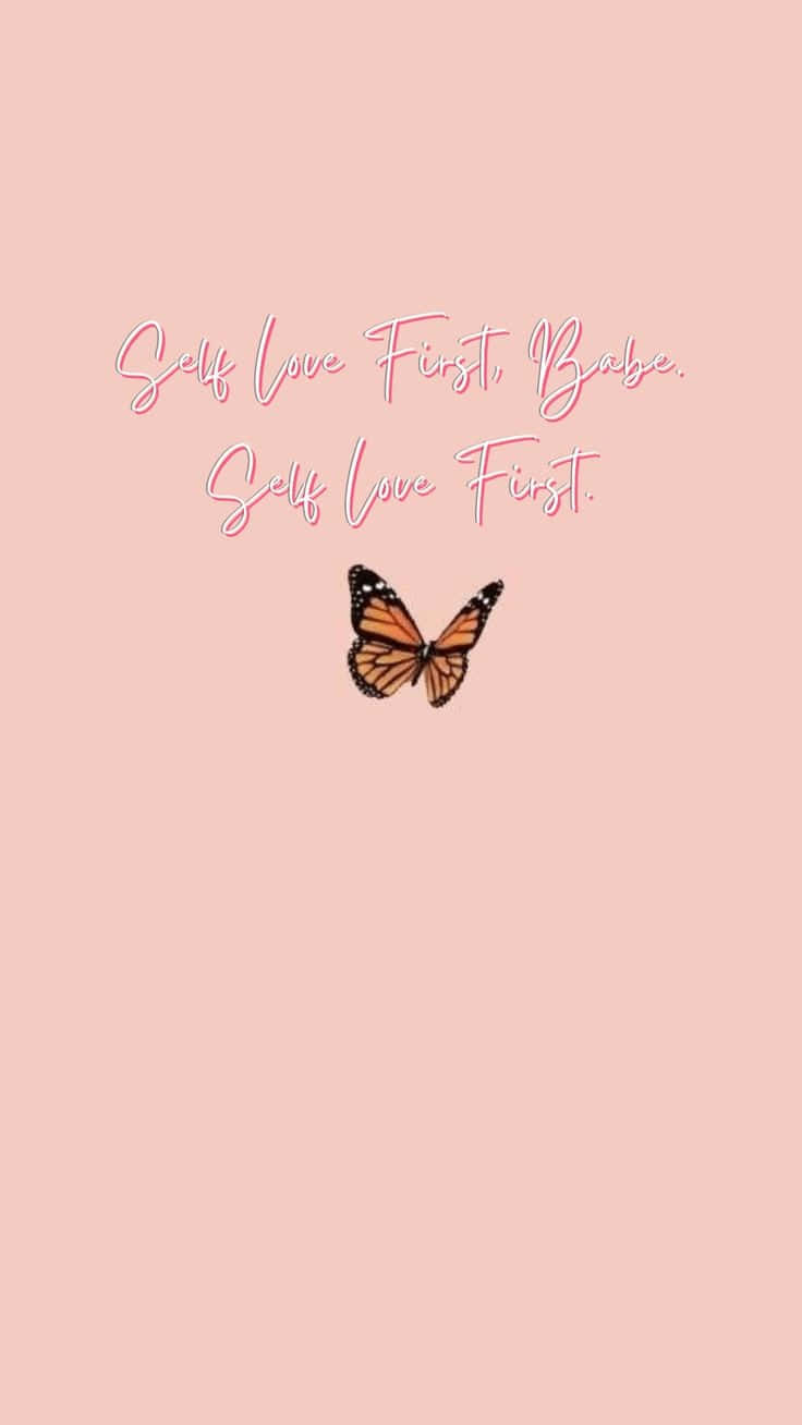 粉紅色背景上，「Self Love First Babe」字樣下方的君主斑蝶。