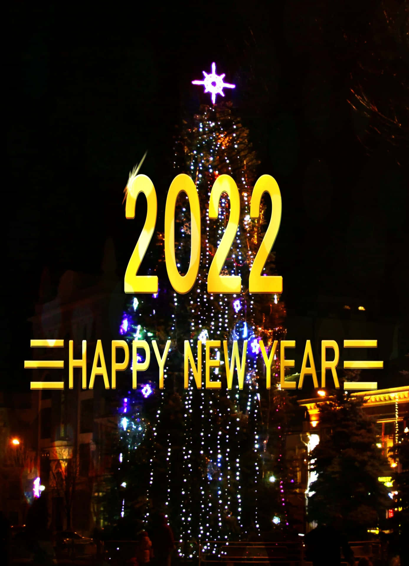 夜晚裝飾的聖誕樹，帶有 '2022 HAPPY NEW YEAR' 文字疊加。