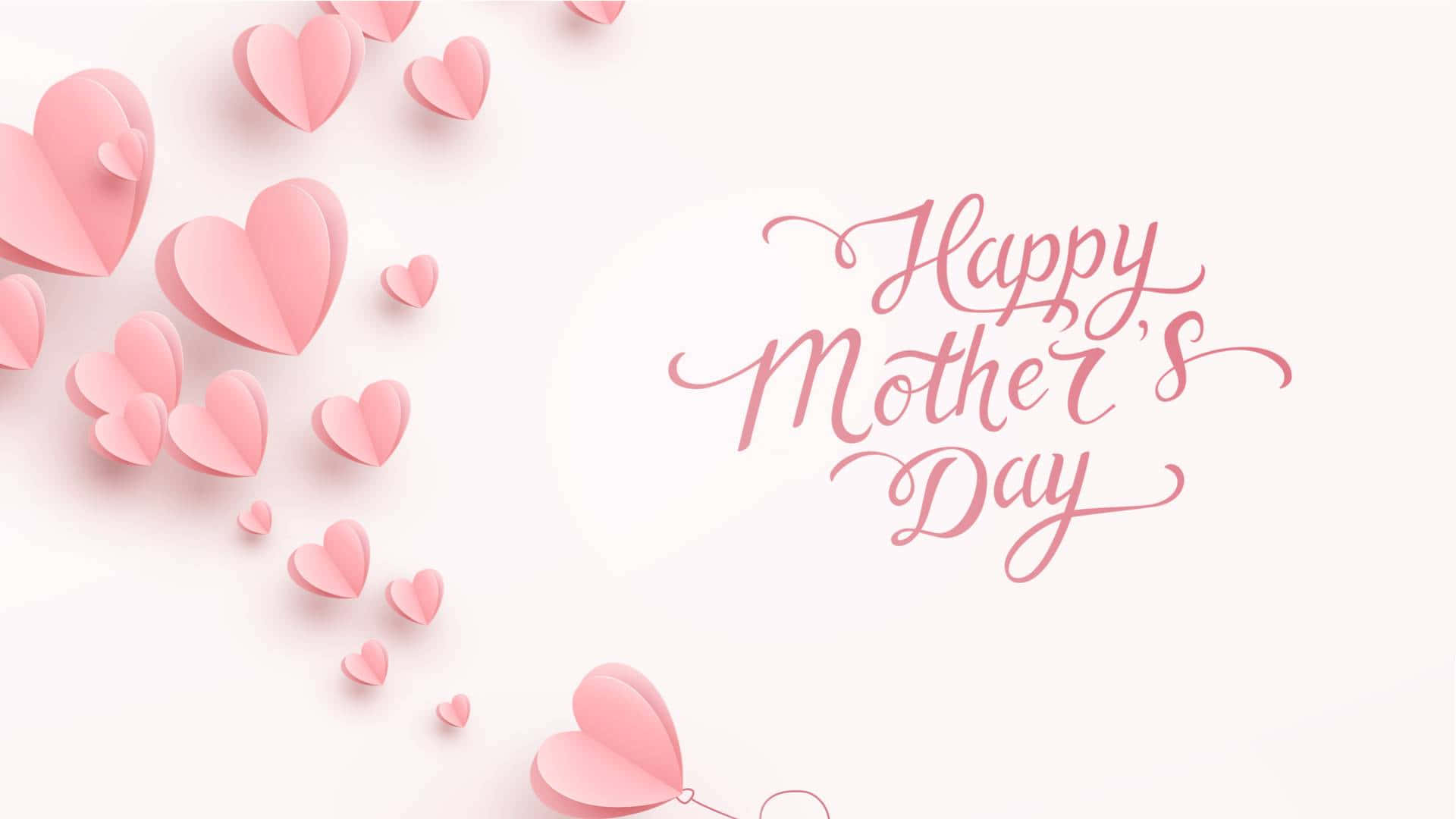 用於賀卡的粉紅色紙心形和Happy Mother's Day字體。
