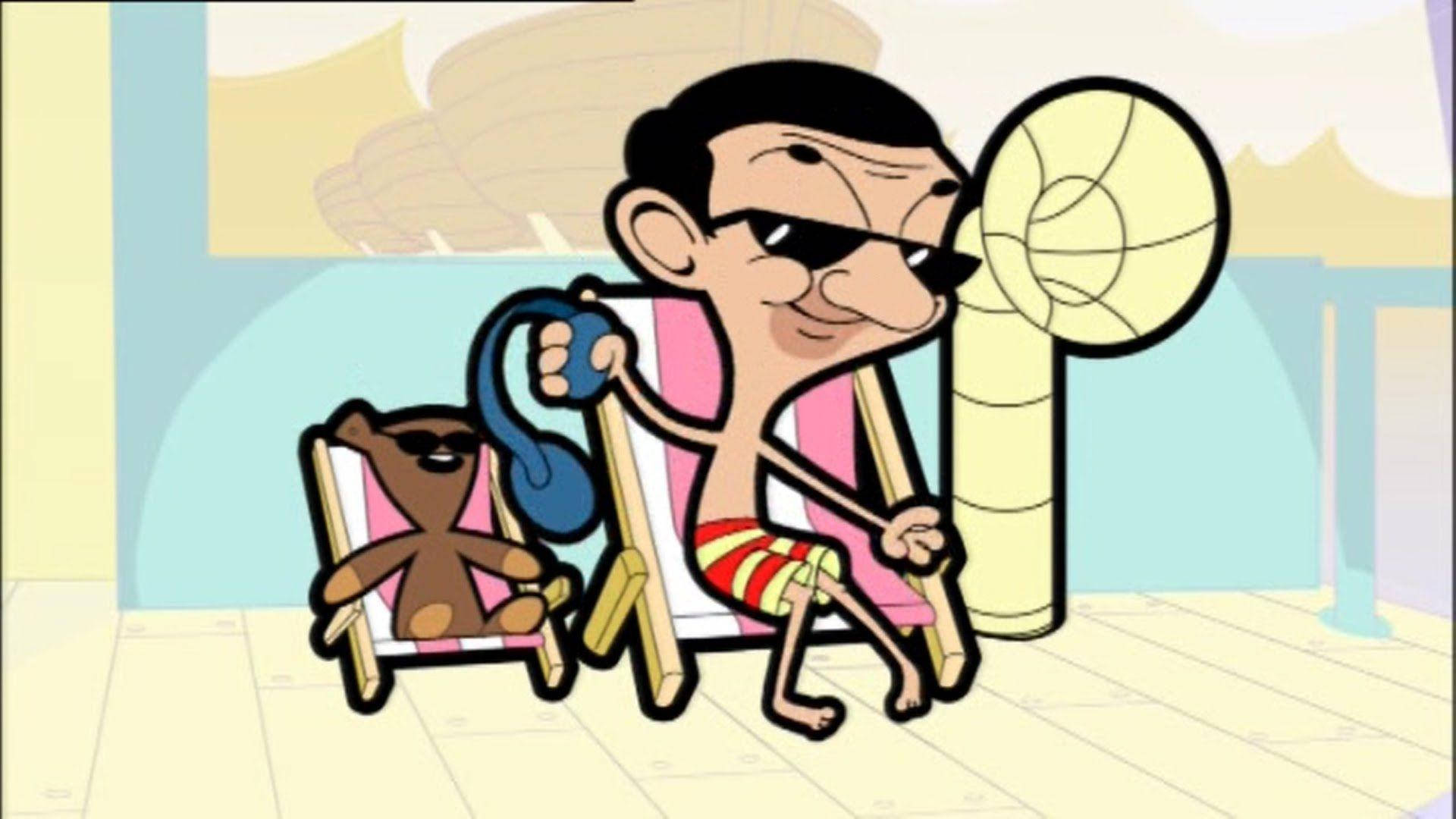 Mr Bean 和他的泰迪熊在沙灘椅上閒逛，風扇吹著。