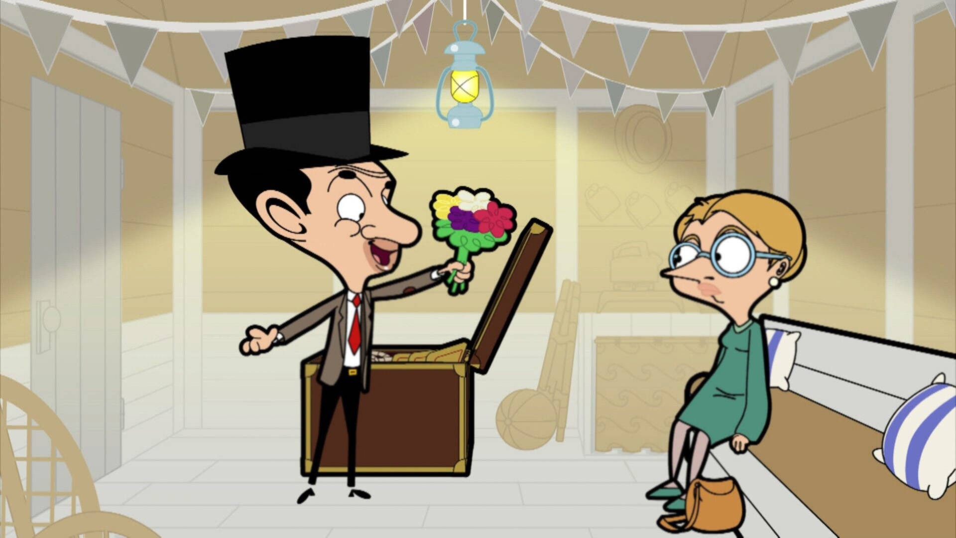 憨豆先生魔法日 壁紙 — Mr Bean 戴著高帽，在一個溫暖照明的房間裡，掛著彩旗和燈籠，愉快地向一位懷疑的女性獻上色彩繽紛的花束。