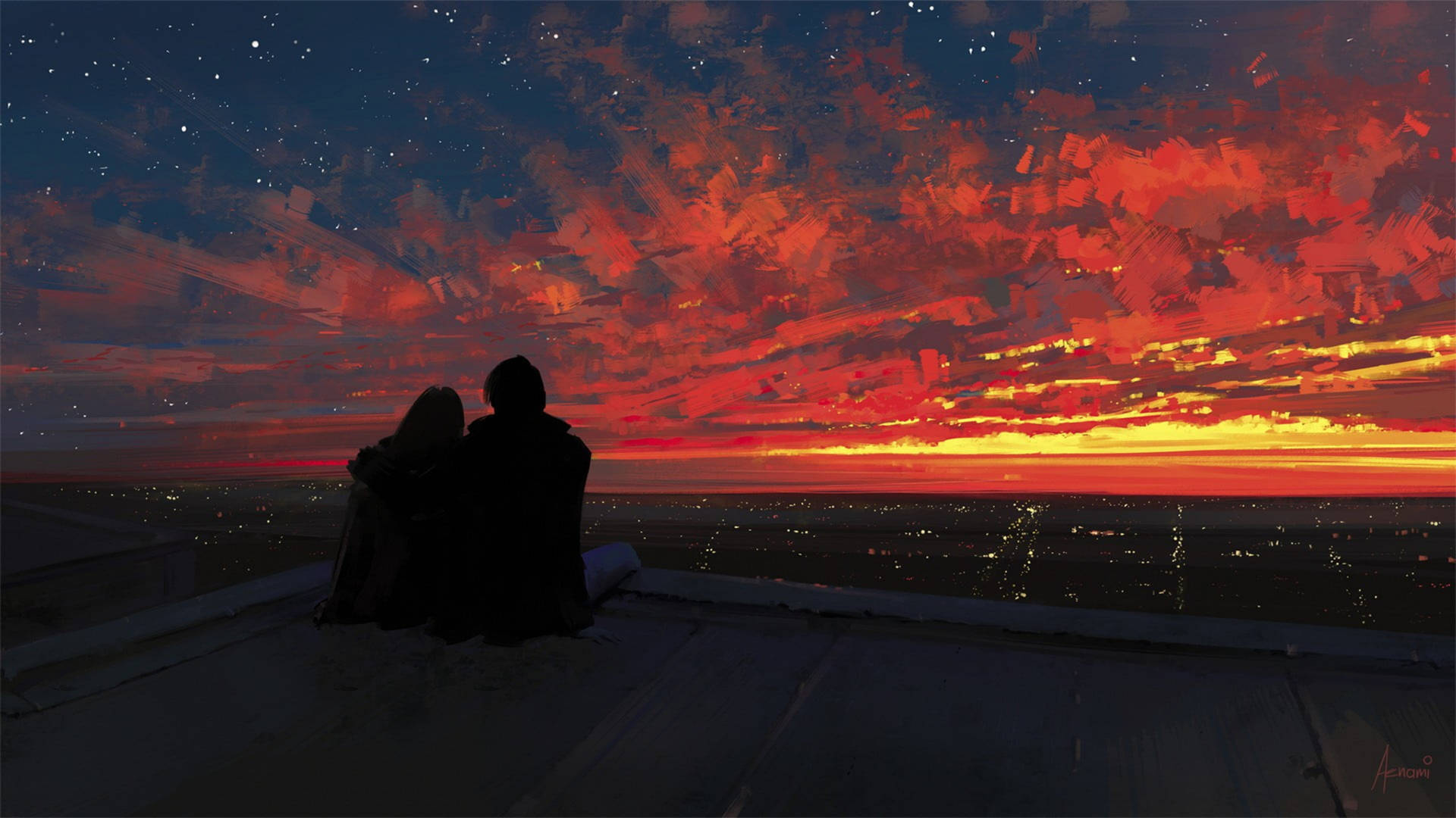 屋頂上觀看夕陽和城市燈光的剪影情侶