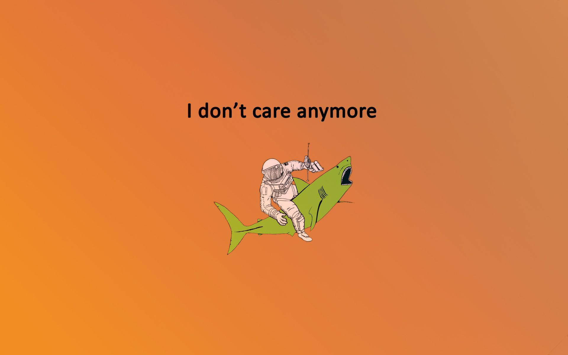 太空人騎著綠色鯊魚，橙色背景上寫著 I don't care anymore