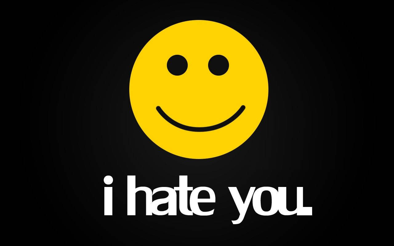 黑色背景上的黃色笑臉，文字為 i hate you