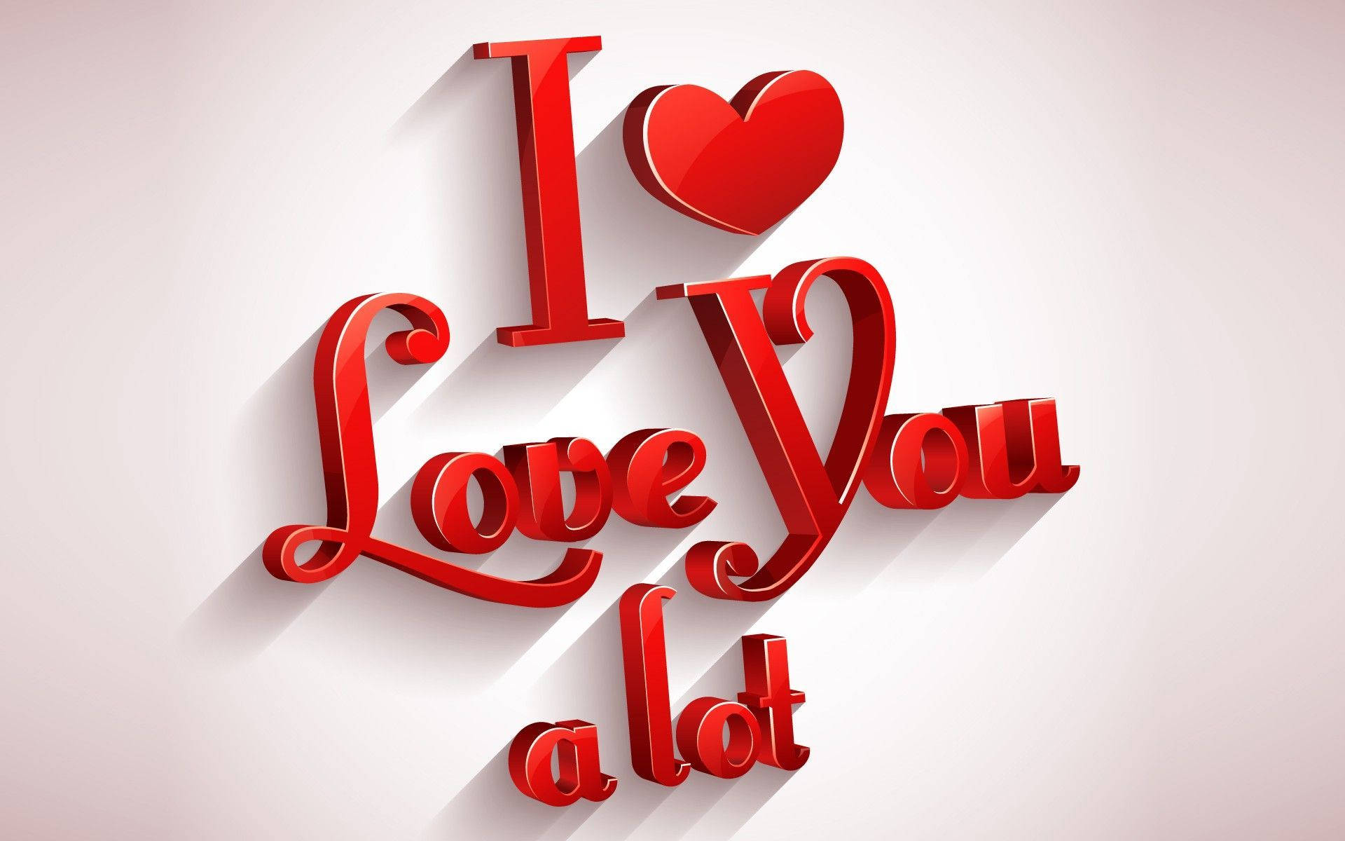 紅色3D文字寫著「I Love You a lot」並帶有心形符號。