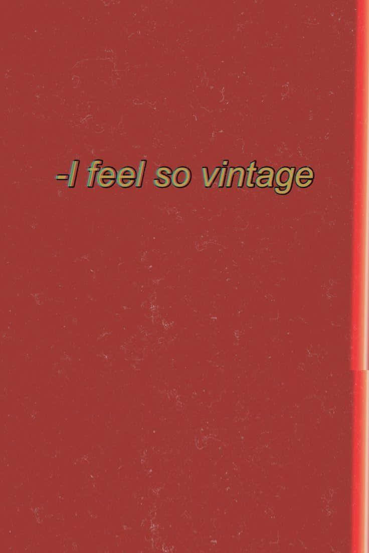 帶有紋理的紅色背景上寫有「I feel so vintage」的復古文字