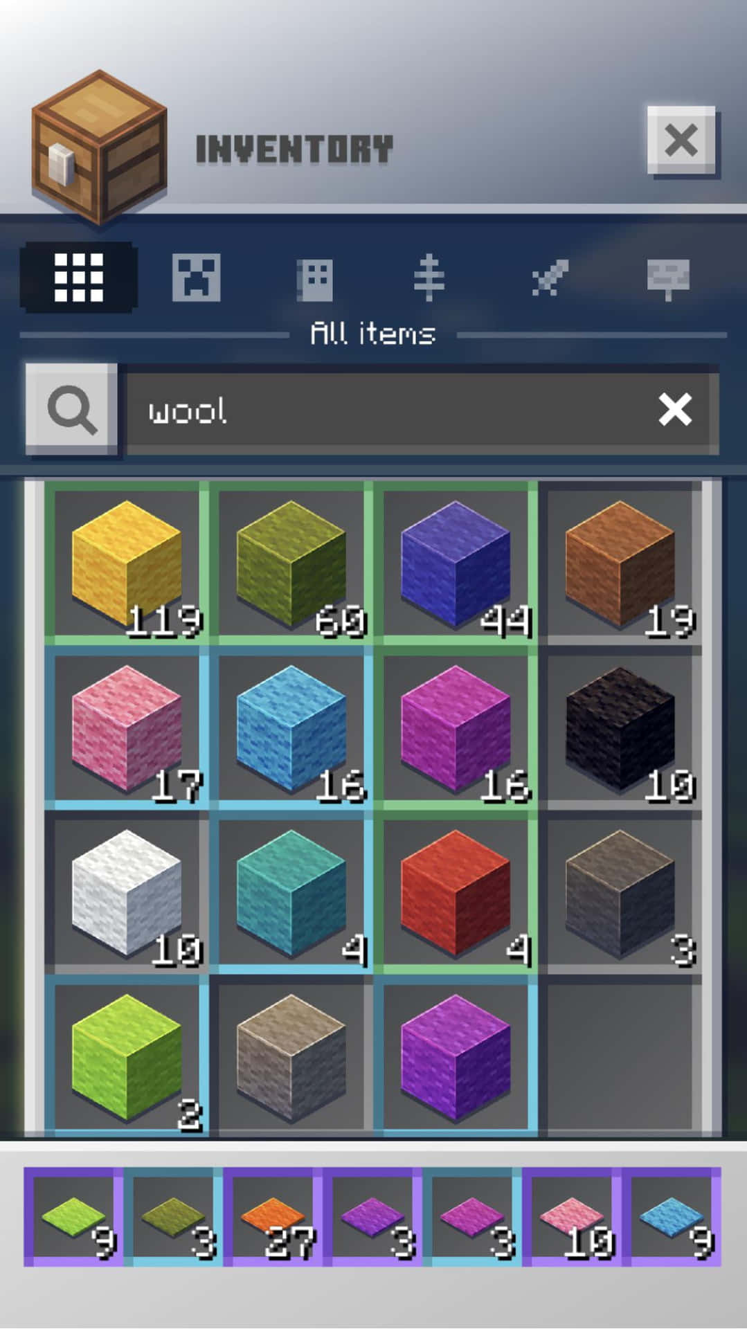 Minecraft物品欄顯示各種顏色的羊毛方塊及堆疊數量。