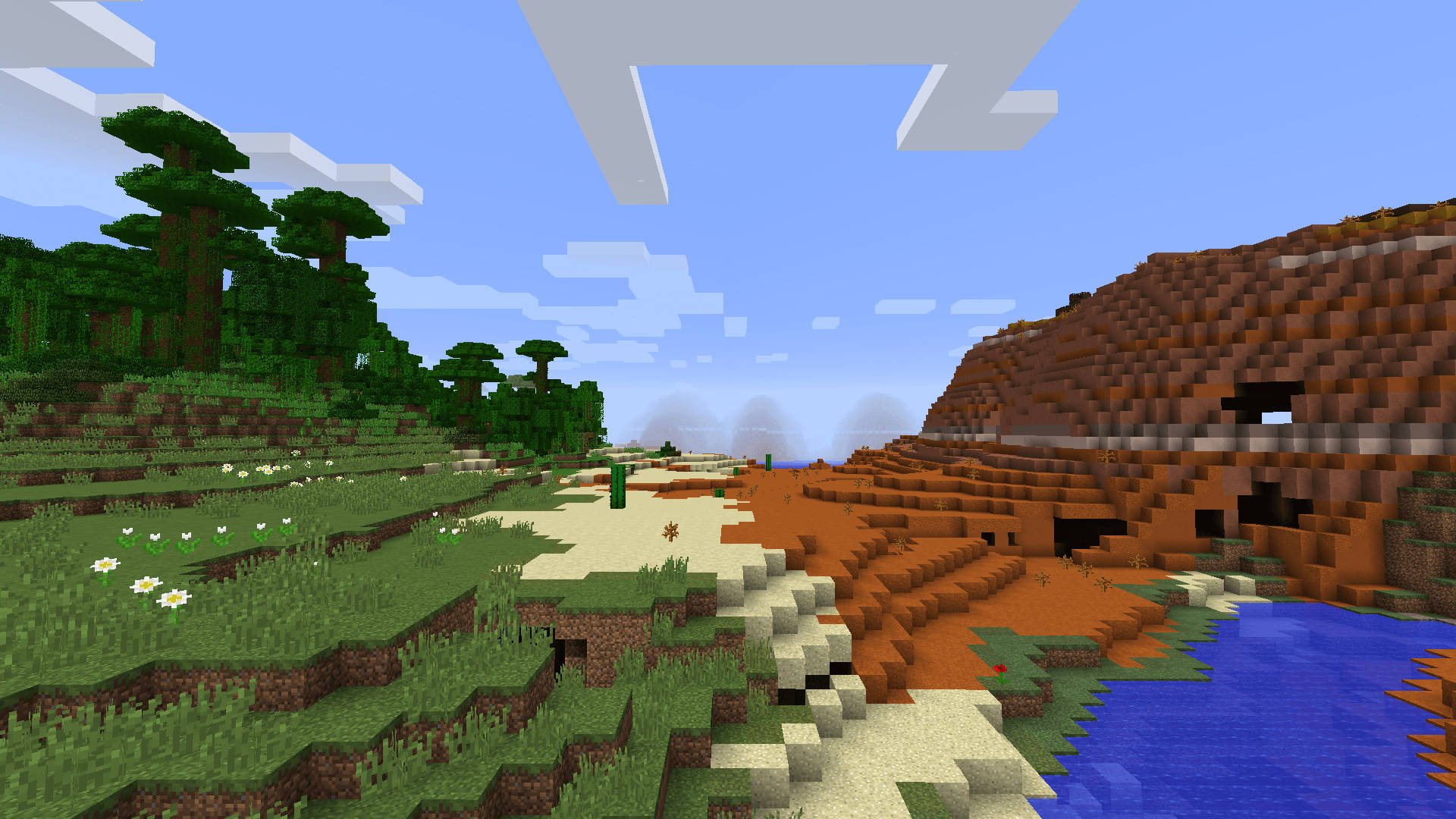 藍天下有樹木、河流和山脈的Minecraft景觀